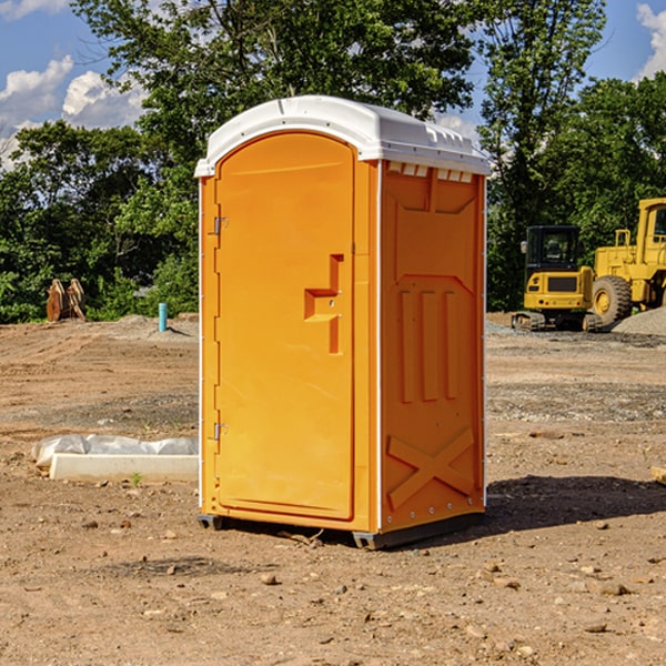 how often are the porta potties cleaned and serviced during a rental period in Buhler